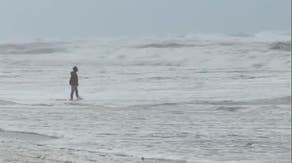 Slow-moving system to bring tropical downpours, rough surf and strong winds to the Gulf Coast