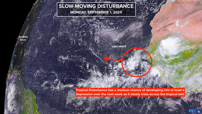 This image shows information on a tropical disturbance that moved off the western coast of Africa and into the Atlantic.