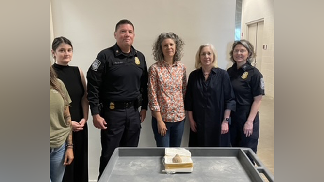 Ashley McGuffey (Ethnology Collections Manager), PD Shane Pequano, Dr. Claire Nicholas (Assistant Curator of Ethnology), Dr. Janet Braun, Museum Director, and CBP Agriculture Specialist.