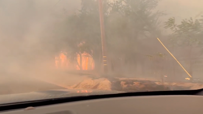 Structures are seen burning as the 6-5 Wildfire rages in California on Sept. 2, 2025.