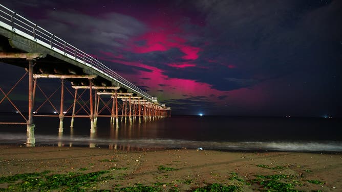 The Northern Lights visible through clouds over Saltburn-by-the-Sea in North Yorkshire. Picture date: Tuesday September 2, 2025. (Photo by Owen Humphreys/PA Images via Getty Images)