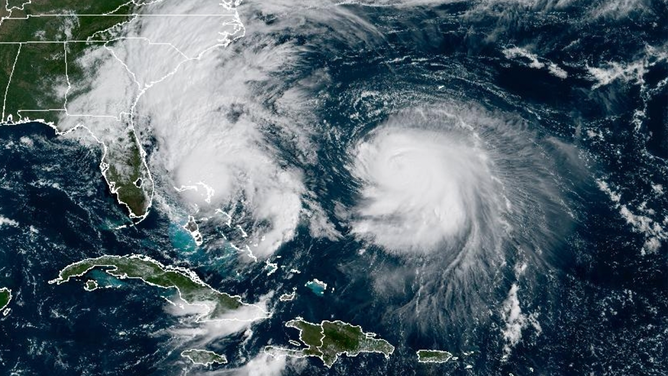Tropical Storm Imelda on the left near Florida, and Hurricane Humberto on the right in the Atlantic, both seen by NOAA GOES Satellite on Sept. 29, 2025.