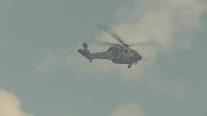 This image shows a helicopter being used to help extinguish the 2-7 Wildfire burning in Calaveras County, California, on Sept. 2, 2025.