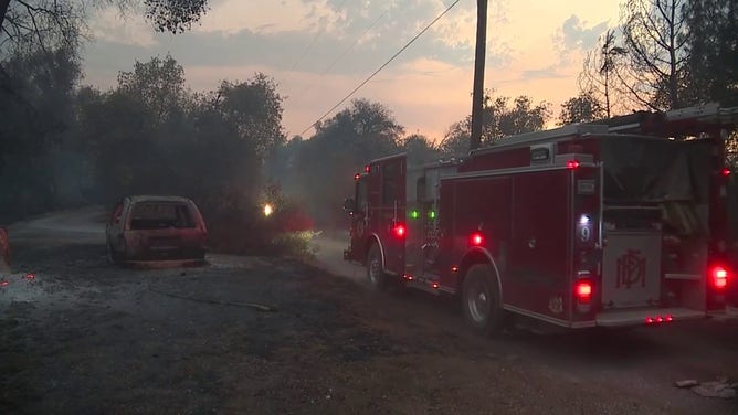 This image shows firefighters working to extinguish the 2-7 Wildfire in Calaveras County, California, on Sept. 2, 2025.