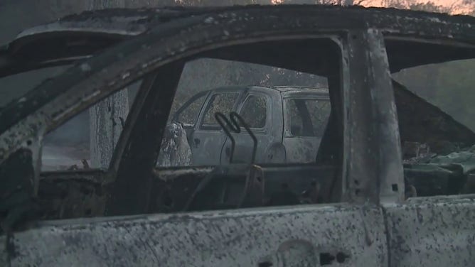 This image shows vehicles that were destroyed by flames from the 2-7 Wildfire burning in Calaveras County, California, on Sept. 2, 2025.