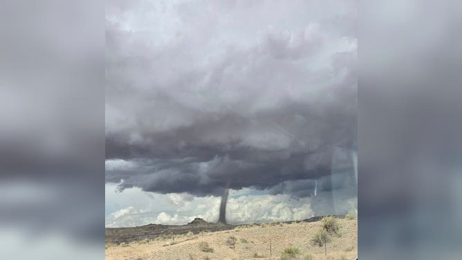 Photos: Rare Utah tornado spotted swirling through desert terrain