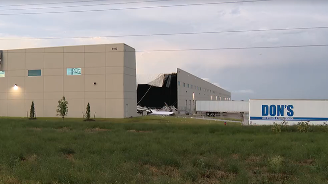 Damage at Walmart distribution center after severe storms on Sunday.
