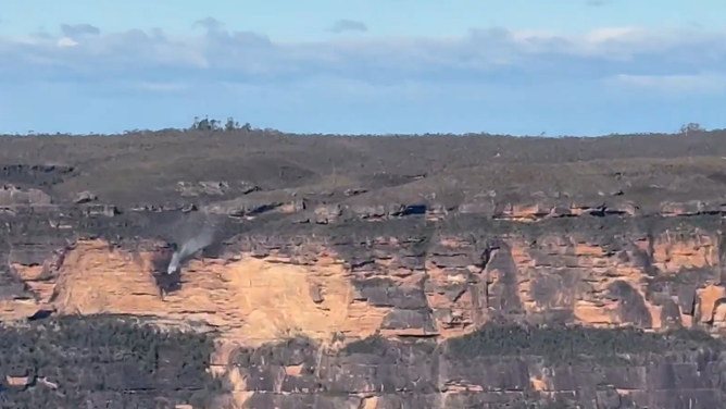 Reverse waterfall seen on cliffside in Katoomba, New South Wales, Australia.