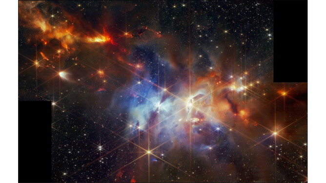 In this image of the Serpens Nebula from the Near-Infrared Camera (NIRCam) on NASA’s James Webb Space Telescope, astronomers found a grouping of aligned protostellar outflows within one small region (the top left corner). In the Webb image, these jets are signified by bright clumpy streaks that appear red, which are shockwaves from the jet hitting surrounding gas and dust.