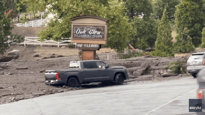 Truck caught in California flash flood