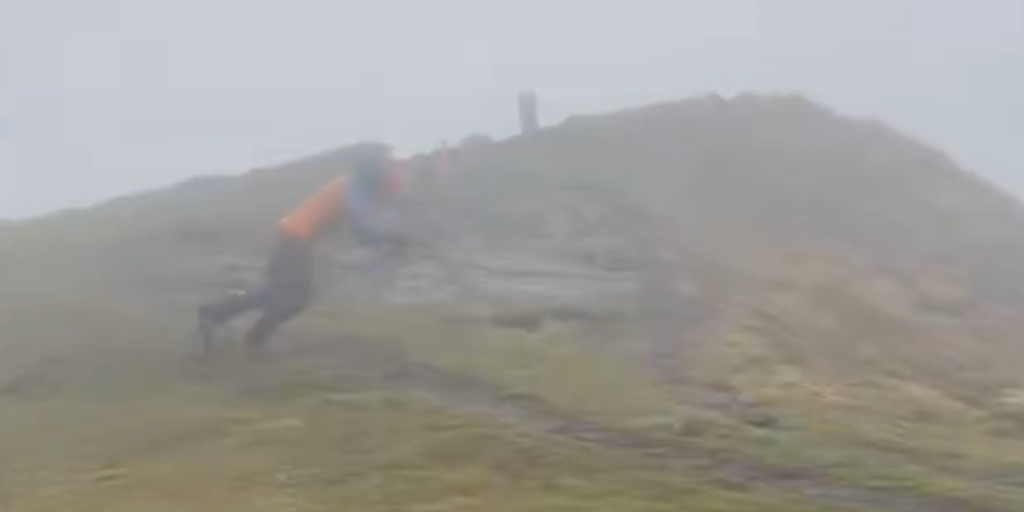 Man takes stroll on French mountain peak amid 115 mph winds