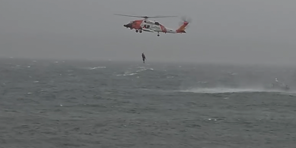 See it: Coast Guard rescues father and son after their boat capsizes
