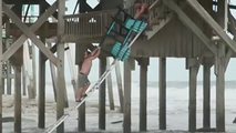 Residents scramble to salvage memories, belongings from NC homes teetering on collapse into Atlantic
