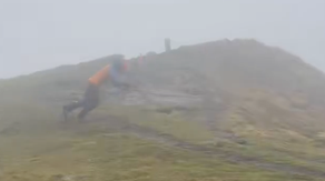 Watch: Man takes stroll on French mountain peak amid 115 mph winds
