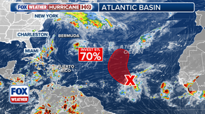 Invest 97L could develop into tropical depression as disturbance swirls across Atlantic