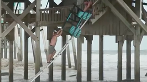 Residents scramble to salvage memories, belongings from NC homes teetering on collapse into Atlantic