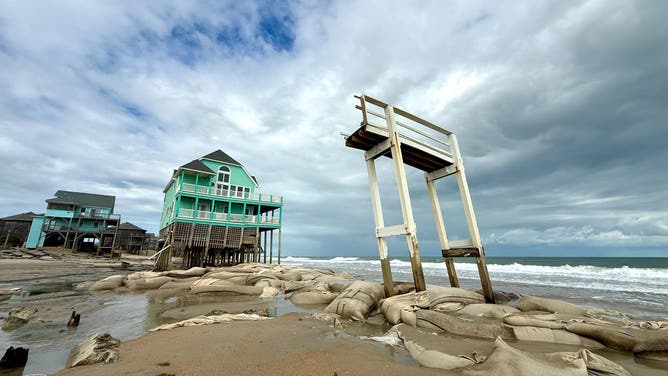 This image from FOX Weather Correspondent Robert Ray shows large waves crashing onshore in Buxton, North Carolina, where numerous homes have fallen into the Atlantic over the past few weeks.