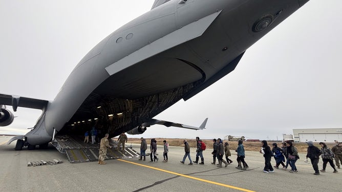 Alaska Air National Guard C-17 Globemaster III aircrew, assigned to the 176th Wing, evacuate approximately 300 displaced western Alaska residents from Bethel, Alaska, following Typhoon Halong, Oct. 15, 2025. The State Emergency Operations Center and the Alaska Organized Militia continue to coordinate response operations following the severe storm that struck Alaska’s West Coast.