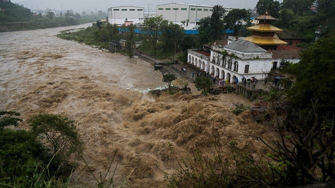 Water level rises in the Bagmati river during the rainfall in Kathmandu, Nepal on October 4, 2025. The National Disaster Risk Reduction and Management Authority has announced, vehicle movement in and out of the Kathmandu valley has been suspended for three days from October 4 to 6 due to the forecast of floods and landslides from the Department of Hydrology and Meteorology.