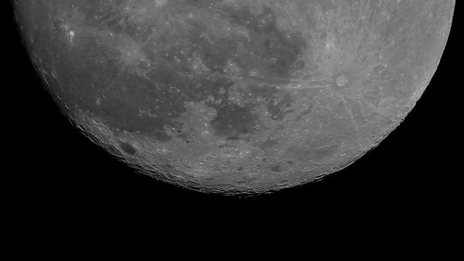 The waxing gibbous moon is seen shining over Bogota on October 5, 2025.