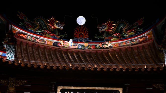 A full moon lights up the night sky on the Mid-Autumn Festival on October 6, 2025 in Suzhou, Jiangsu Province of China.