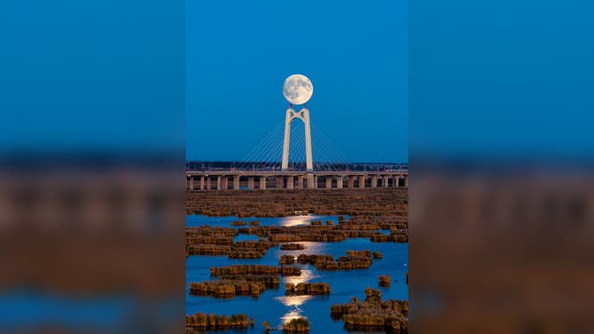 A full moon lights up the night sky on the Mid-Autumn Festival on October 6, 2025 in Daqing, Heilongjiang Province of China.