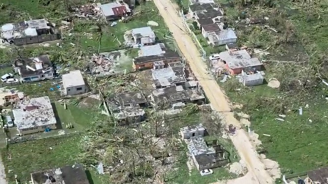 This screen grab from an aerial video shows damaged buildings and structures in St. Elizabeth Parish, Jamaica, on October 29, 2025, after Hurricane Melissa tore through the island. Hurricane Melissa ripped up trees and knocked out power after making landfall in Jamaica on October 28, 2025 as one of the most powerful hurricanes on record, inundating the island nation with rains that threaten flash floods and landslides. (Photo by AFP VIDEOGRAPHICS / AFP) (Photo by AFP VIDEOGRAPHICS/AFP via Getty Images)