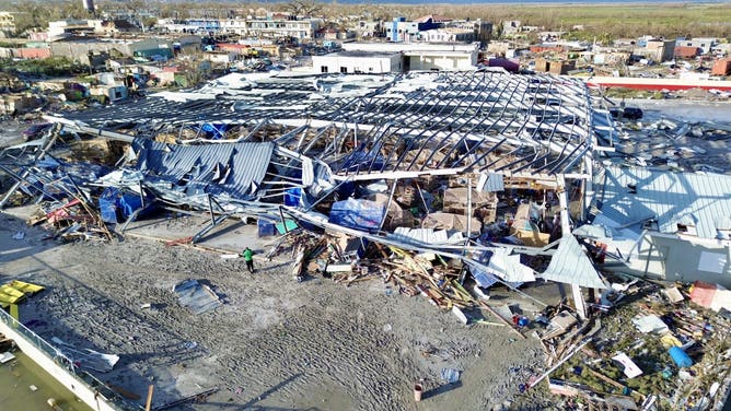 An aerial view of the destroyed Black River Market following the passage of Hurricane Melissa, in Black River, St. Elizabeth, Jamaica on October 29, 2025. Hurricane Melissa bore down on the Bahamas October 29 after cutting a path of destruction through the Caribbean, leaving 30 people dead or missing in Haiti and parts of Jamaica and Cuba in ruins.