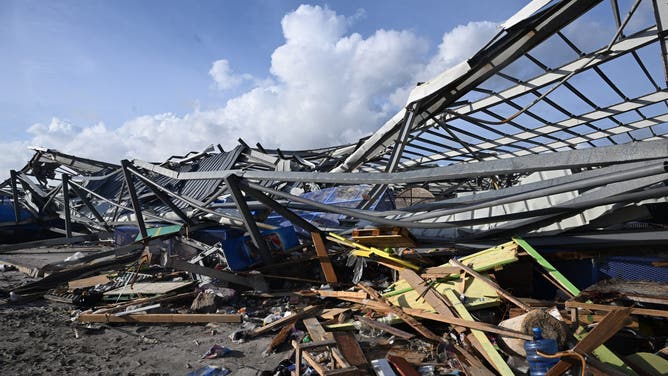 Remains of the Black River Market are seen following the passage of Hurricane Melissa, in Black River, Jamaica on October 29, 2025. Hurricane Melissa bore down on the Bahamas October 29 after cutting a path of destruction through the Caribbean, leaving 30 people dead or missing in Haiti and parts of Jamaica and Cuba in ruins.