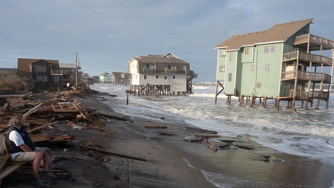 Debris from homes washed away by rough surf in Buxton, North Carolina after Hurricane Imelda passed off shore in October 2025.