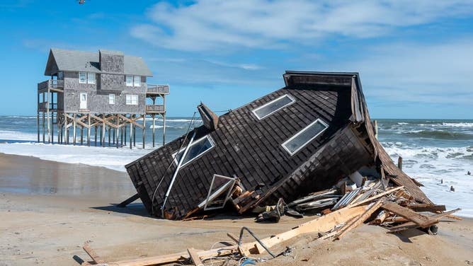 Photos: Massive debris piles along Outer Banks after 9 homes crumble from rough surf
