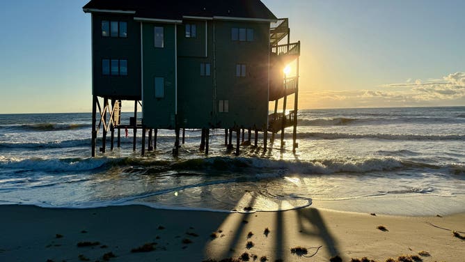 This image from FOX Weather Correspondent Robert Ray shows large waves crashing onshore in Buxton, North Carolina, where numerous homes have fallen into the Atlantic over the past few weeks.