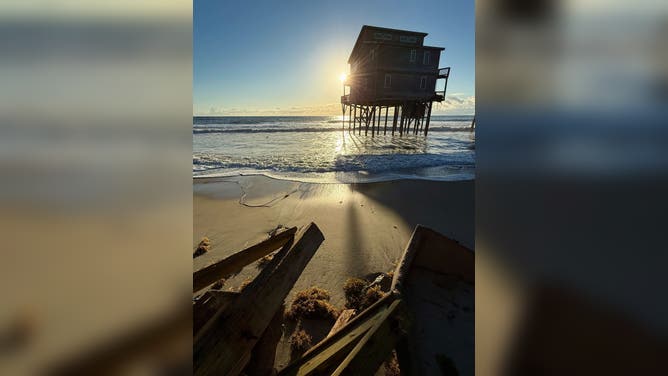This image from FOX Weather Correspondent Robert Ray shows large waves crashing onshore in Buxton, North Carolina, where numerous homes have fallen into the Atlantic over the past few weeks.