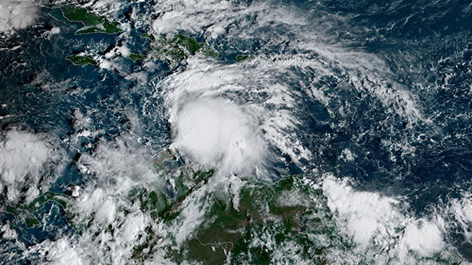 This satellite image shows Invest 98L in the Caribbean on Oct. 21, 2025.