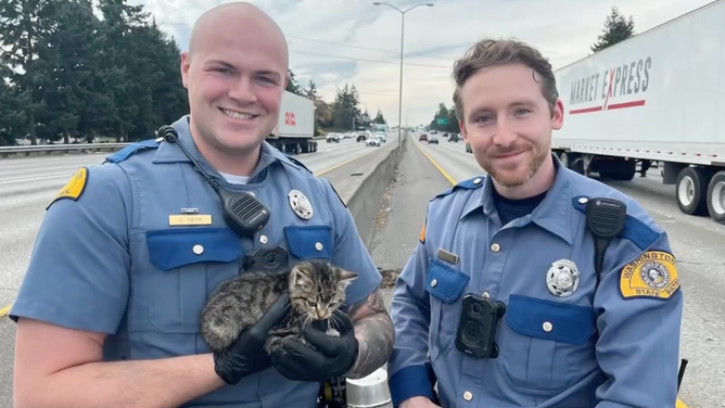 The deputies who rescued the kitten.