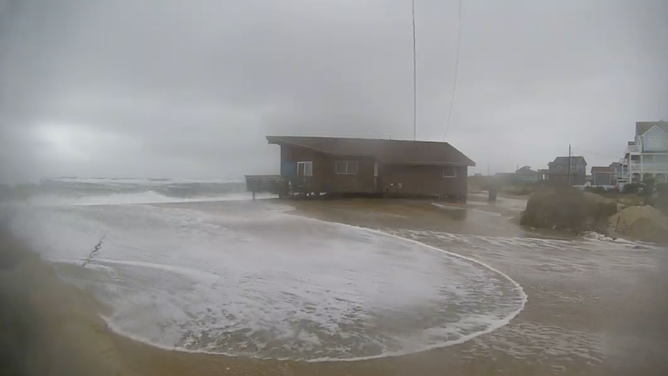Cameras set up by FOX Weather Storm Chaser Mark Sudduth show coastal flooding in Rodanthe, North Carolina on Sunday, Oct. 12, 2025.