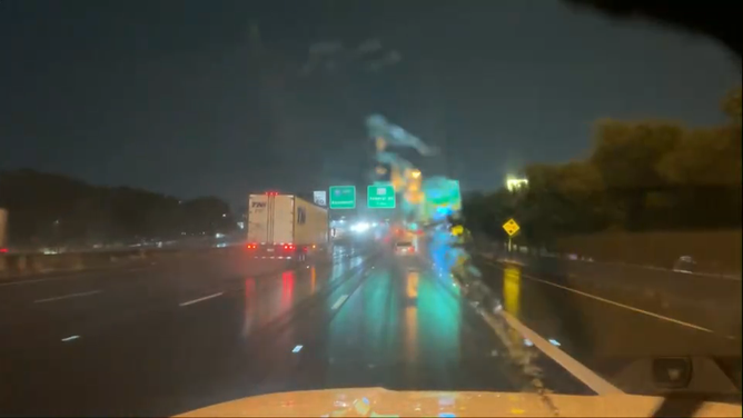 Heavy rains soak a Houston interstate