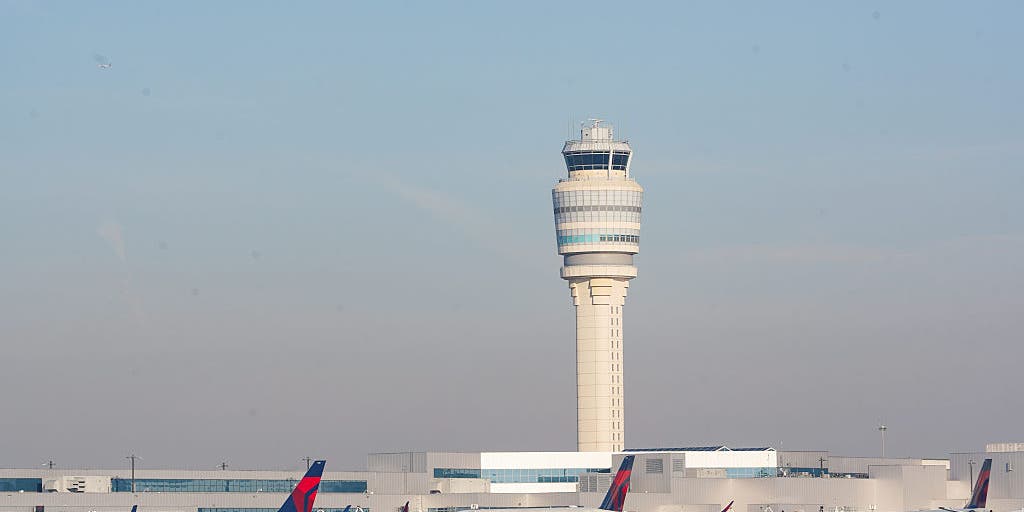 Atlanta airport tower evacuated, as severe storms disrupt busy Thanksgiving travel rush