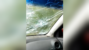 SEE IT: Residents in Brazil are pounded with hailstones shattering a windshield, injuring at least 200