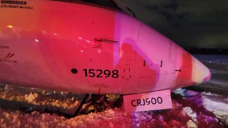Delta aircraft slides off runway upon icy landing in Des Moines International Airport, all passengers safe