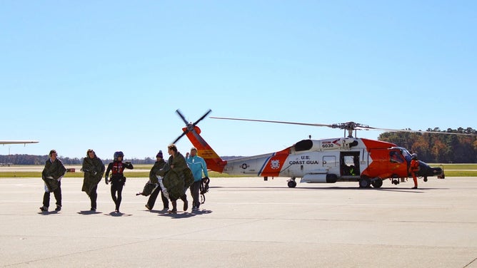The U.S. Coast Guard MH-60 Jayhawk helicopter which rescued 5 people after their sail boat sunk off the coast of North Carolina.