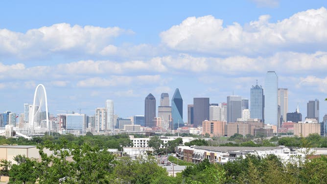 Skyline of Dallas Texas on a partly cloudy spring afternoon.