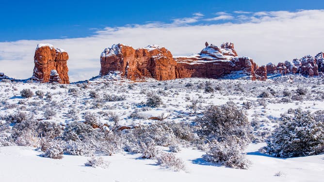 Ham Rock atop Ham Rock Butte after a winter snow in Arches National Park, Moab, Utah.