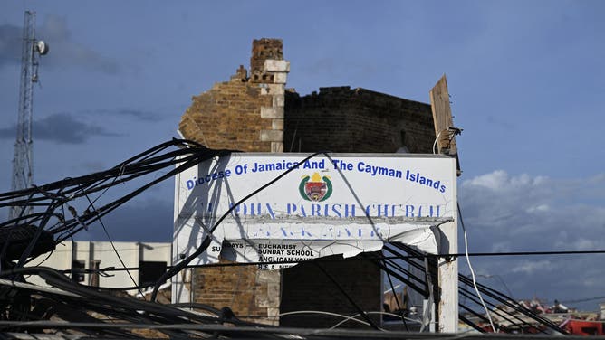 A building is seen damaged following the passage of Hurricane Melissa, in Black River, St. Elizabeth, Jamaica on October 29, 2025. Hurricane Melissa bore down on the Bahamas October 29 after cutting a path of destruction through the Caribbean, leaving 30 people dead or missing in Haiti and parts of Jamaica and Cuba in ruins.