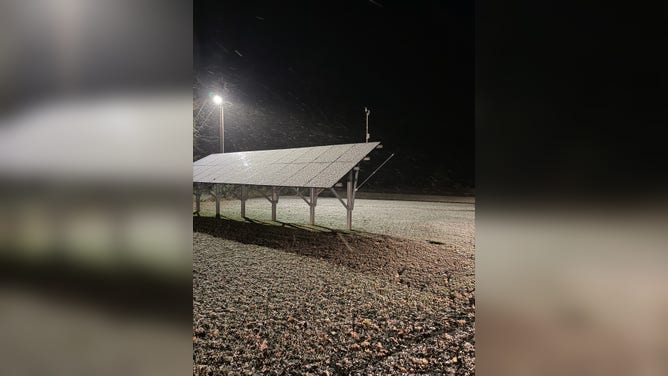 Snow accumulated Monday evening in Lancaster County, South Carolina.