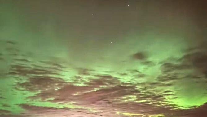 Northern lights seen over Budd Lake, New Jersey on Tuesday Nov. 11, 2025.