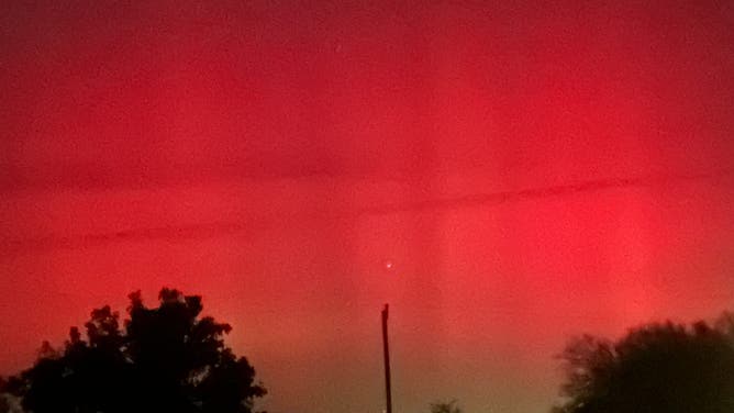 Northern lights visible through camera lens over Skiatook, OK on Nov. 11, 2025.