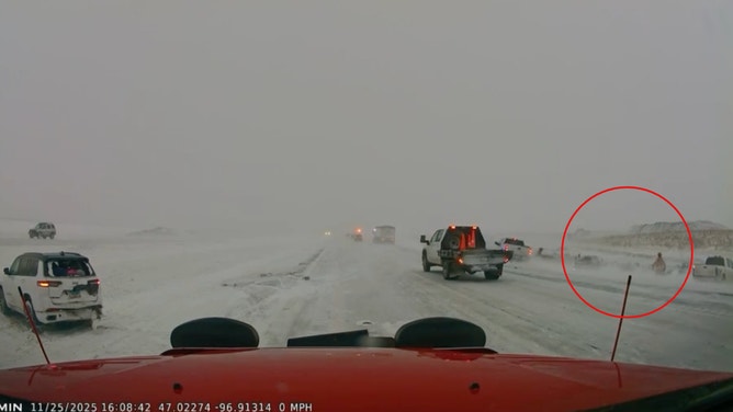 The firefighters jumped out of the way of the truck.