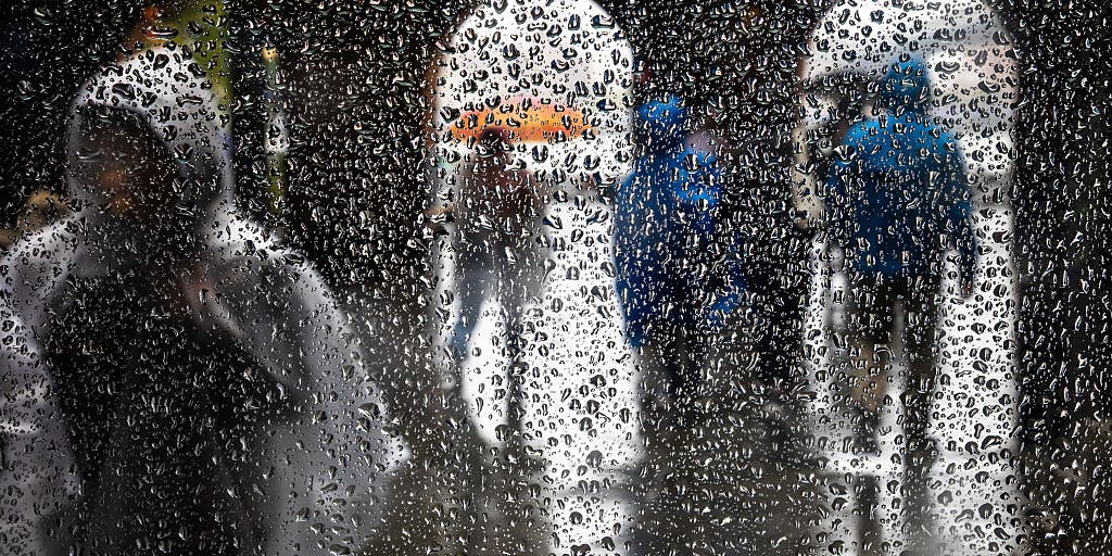 East Coast holiday travelers soaked as powerful storms deliver heavy rain and intense wind gusts