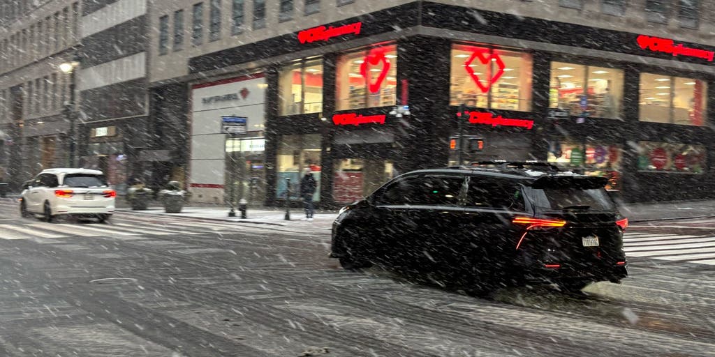 Travel nightmare: Snow causes delays and power outages across the Northeast